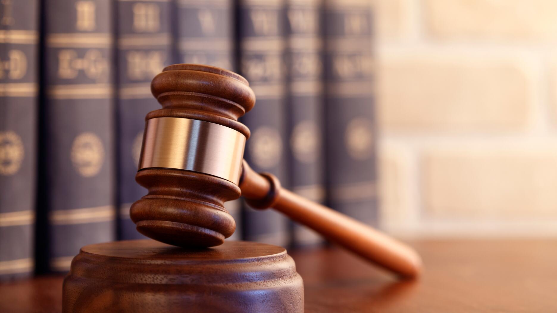 Un homme du Queens reconnu coupable de la mort matraquée du propriétaire d'un prêteur sur gages