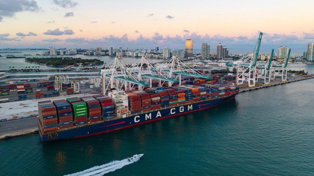 Stock image of shipping containers in port